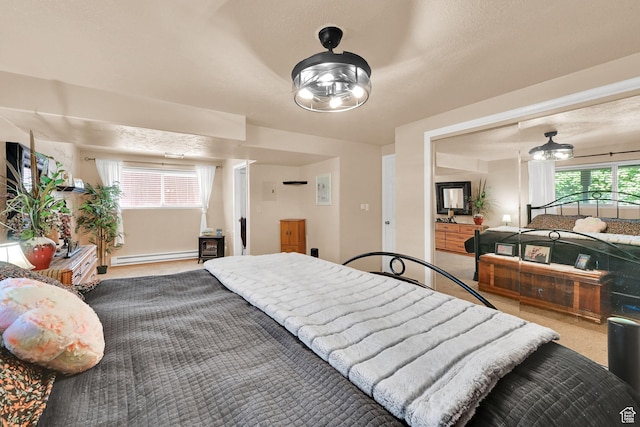1368 E 5800 S, South Ogden, UT 84405 - carpeted bedroom with a baseboard radiator