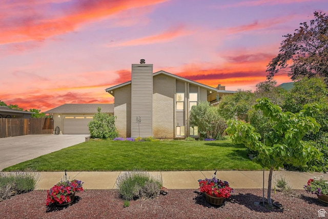 1368 E 5800 S, South Ogden, UT 84405 - mid-century inspired home with concrete driveway, a chimney, and brick siding