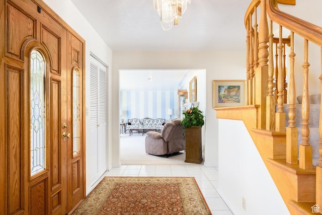 1478 N Ewe Turn St E, Kaysville, UT 84037 - entryway featuring light tile patterned floors, stairway, a chandelier, baseboards, and wallpapered walls