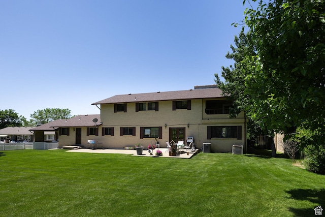 1478 N Ewe Turn St E, Kaysville, UT 84037 - rear view of property with a patio area, central air condition unit, brick siding, and an outdoor hangout area
