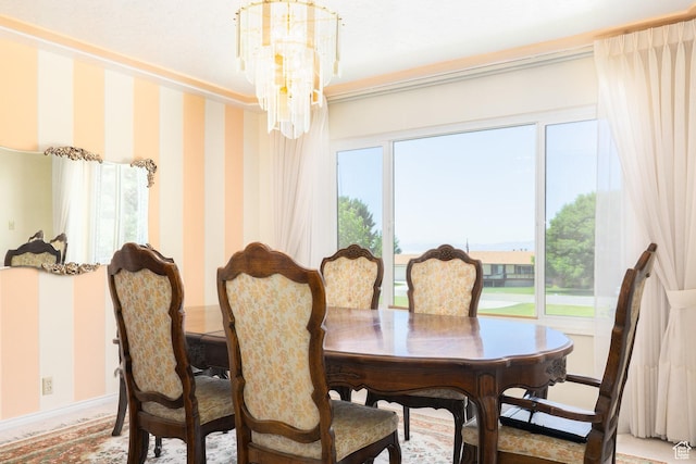 1478 N Ewe Turn St E, Kaysville, UT 84037 - dining room with a chandelier, baseboards, and crown molding
