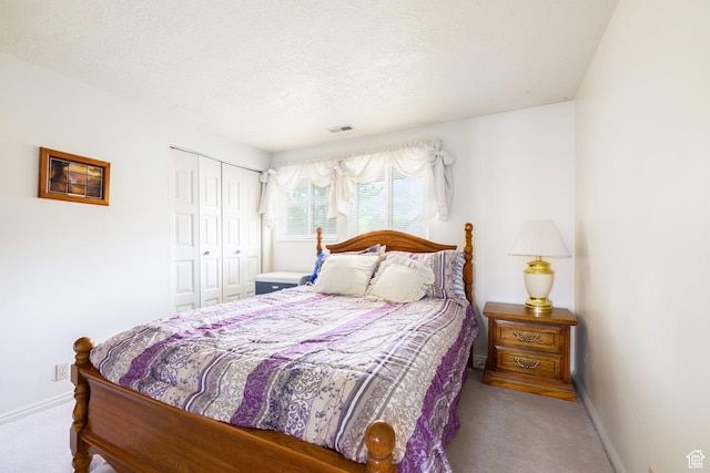 1478 N Ewe Turn St E, Kaysville, UT 84037 - bedroom with carpet, baseboards, a closet, and a textured ceiling