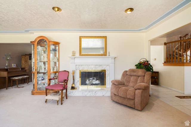 1478 N Ewe Turn St E, Kaysville, UT 84037 - living area featuring a textured ceiling, a high end fireplace, and tile patterned flooring