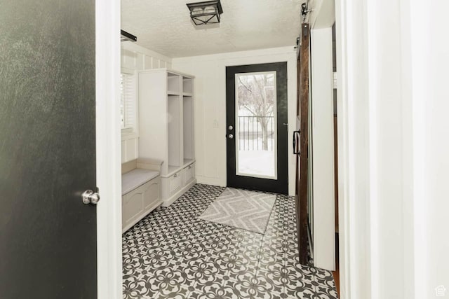 5363 E Cub Rd, Preston, ID 83263 - mudroom featuring a textured ceiling