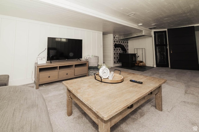 5363 E Cub Rd, Preston, ID 83263 - living room featuring a wood stove and carpet floors