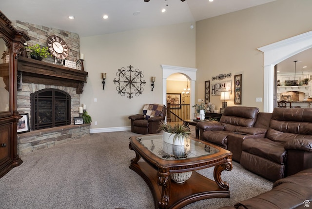 403 W 4000 S, Vernal, UT 84078 - living area featuring a fireplace, carpet flooring, a towering ceiling, recessed lighting, and baseboards