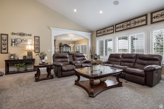 403 W 4000 S, Vernal, UT 84078 - living area featuring carpet floors, a chandelier, high vaulted ceiling, recessed lighting, and arched walkways