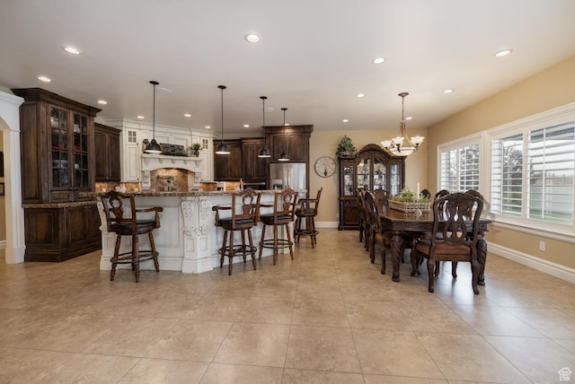 403 W 4000 S, Vernal, UT 84078 - dining room with a chandelier, recessed lighting, baseboards, and light tile patterned floors