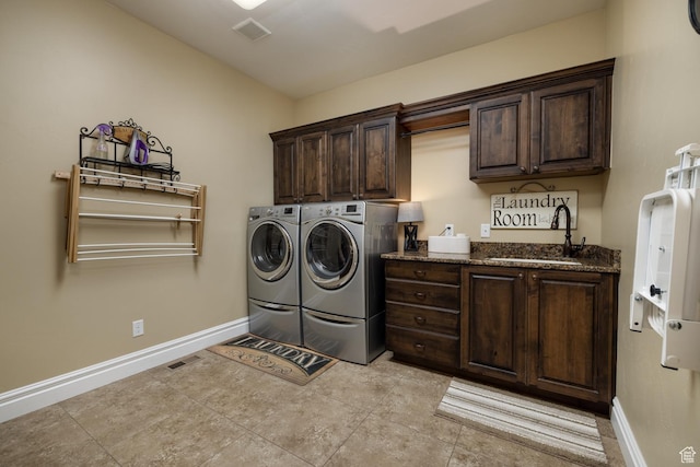 403 W 4000 S, Vernal, UT 84078 - laundry area featuring cabinet space, independent washer and dryer, baseboards, and light tile patterned flooring