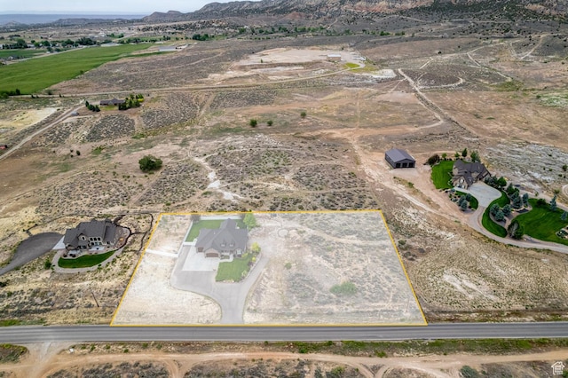 403 W 4000 S, Vernal, UT 84078 - aerial overview of property's location featuring property boundaries highlighted, rural landscape, and a mountainous background
