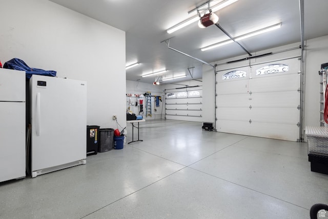 403 W 4000 S, Vernal, UT 84078 - garage featuring freestanding refrigerator and a garage door opener