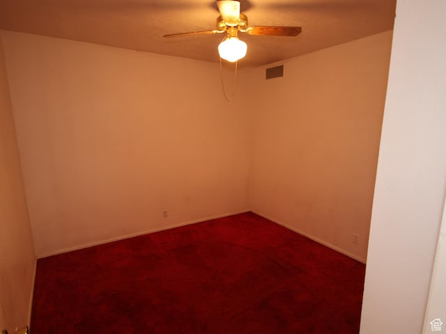 338 E 200 S Unit 338, Logan, UT 84321 - empty room with a ceiling fan, dark carpet, and baseboards