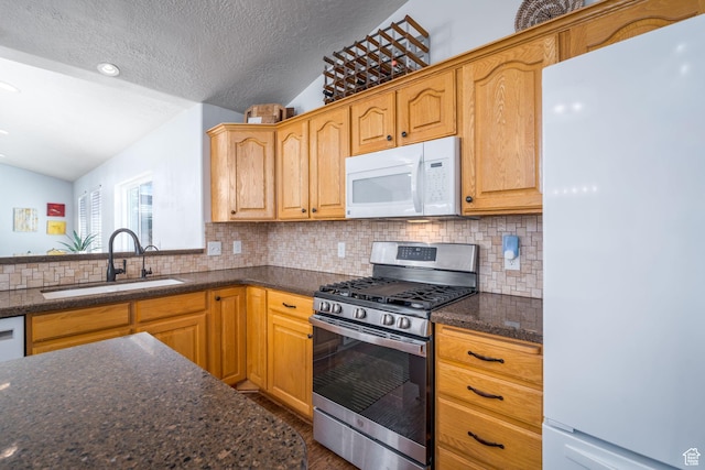 7850 Wasatch Way, Park City, UT 84098 - kitchen with white appliances, a sink, lofted ceiling, tasteful backsplash, and a textured ceiling