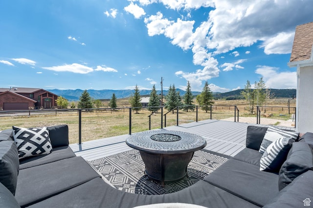 7850 Wasatch Way, Park City, UT 84098 - view of patio / terrace with an outdoor living space with a fire pit, a mountain view, and a view of countryside