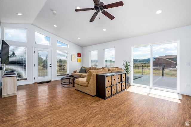 7850 Wasatch Way, Park City, UT 84098 - living area featuring vaulted ceiling, wood finished floors, a ceiling fan, recessed lighting, and a mountain view