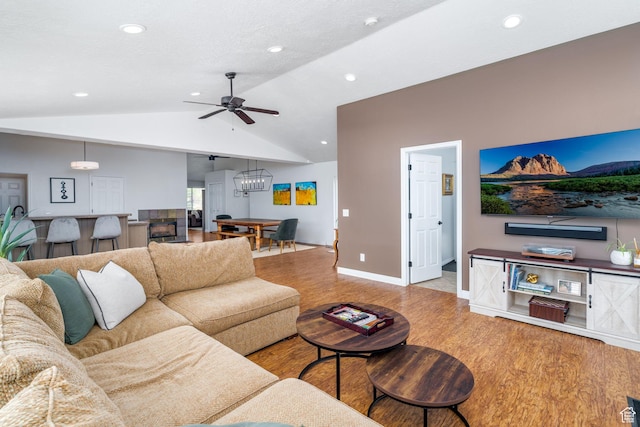 7850 Wasatch Way, Park City, UT 84098 - living area with wood finished floors, vaulted ceiling, a ceiling fan, recessed lighting, and baseboards