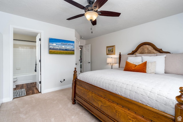7850 Wasatch Way, Park City, UT 84098 - bedroom featuring light colored carpet, baseboards, ensuite bathroom, and ceiling fan