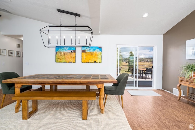 7850 Wasatch Way, Park City, UT 84098 - dining room with wood finished floors, baseboards, vaulted ceiling, and recessed lighting