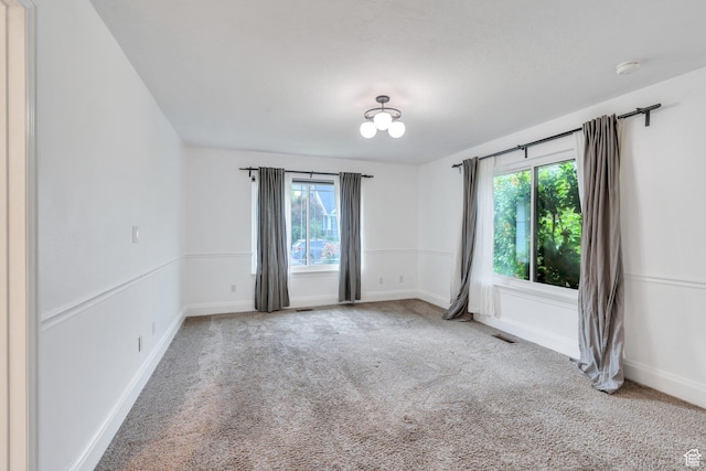 4055 N Cove Dr, Provo, UT 84604 - carpeted empty room with plenty of natural light, a smoke detector, and baseboards