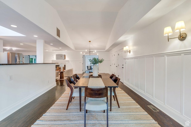 4055 N Cove Dr, Provo, UT 84604 - dining room featuring dark wood-style floors, a decorative wall, a chandelier, and recessed lighting