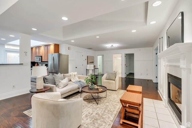 4055 N Cove Dr, Provo, UT 84604 - living room featuring light wood finished floors, recessed lighting, a fireplace, and baseboards