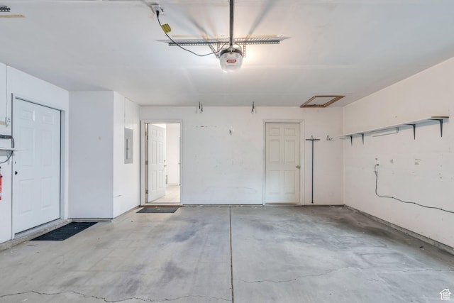 4055 N Cove Dr, Provo, UT 84604 - garage featuring electric panel and a garage door opener