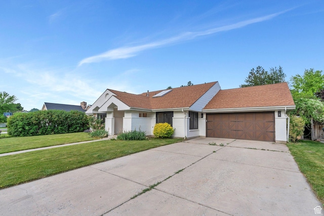 4055 N Cove Dr, Provo, UT 84604 - ranch-style house with a garage, a front lawn, driveway, and stucco siding