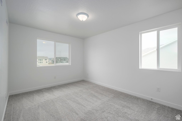 1847 E Badger Ave N Unit B253, Eagle Mountain, UT 84005 - spare room with carpet floors and baseboards