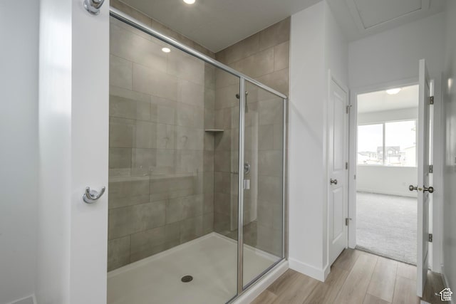 1847 E Badger Ave N Unit B253, Eagle Mountain, UT 84005 - full bath featuring wood finished floors, a stall shower, baseboards, and recessed lighting