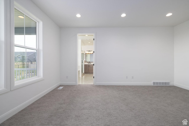 6527 W Barneys Creek Way, West Jordan, UT 84081 - unfurnished room with carpet floors, recessed lighting, and baseboards