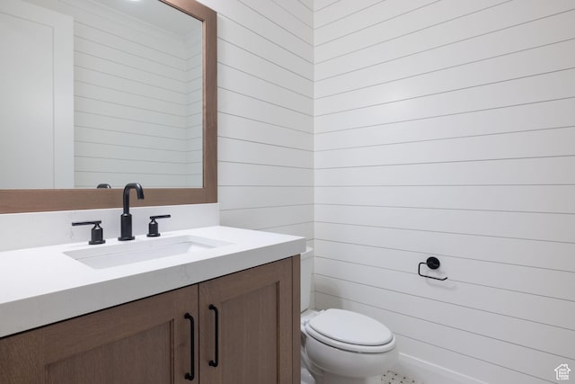 6527 W Barneys Creek Way, West Jordan, UT 84081 - bathroom with vanity, toilet, and wood walls
