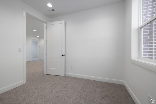 6527 W Barneys Creek Way, West Jordan, UT 84081 - spare room with light carpet, baseboards, and recessed lighting