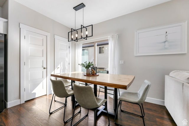 2671 N Garden Dr, Lehi, UT 84043 - dining area with a chandelier, baseboards, and dark wood finished floors