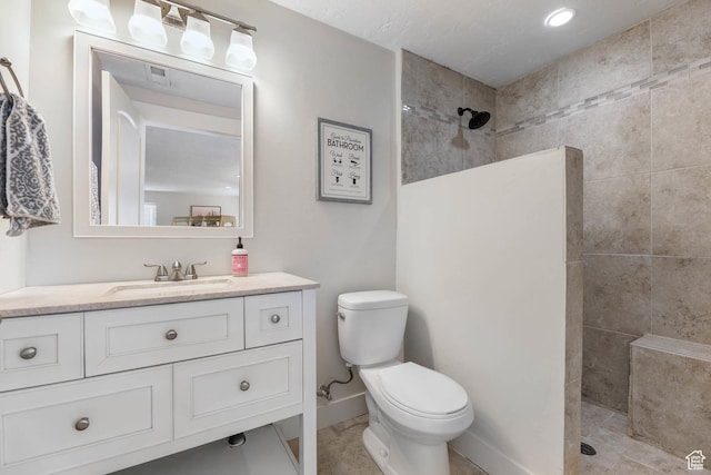 2671 N Garden Dr, Lehi, UT 84043 - bathroom with vanity, a walk in shower, toilet, and baseboards