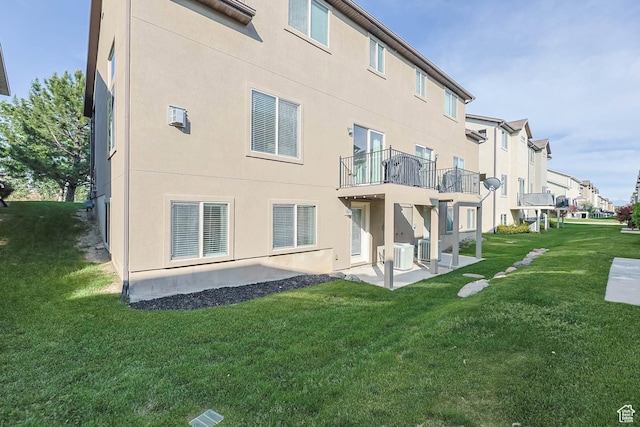 2671 N Garden Dr, Lehi, UT 84043 - rear view of house with a yard, a patio area, central AC, and stucco siding