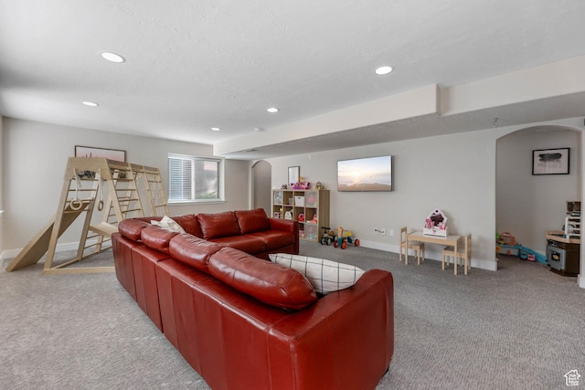2671 N Garden Dr, Lehi, UT 84043 - living room featuring arched walkways, carpet floors, recessed lighting, and baseboards