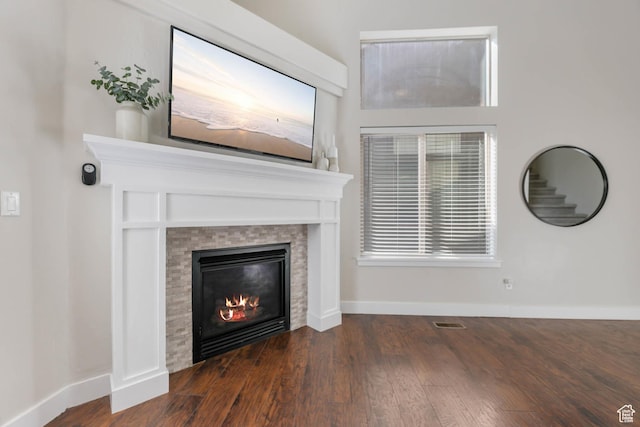 2671 N Garden Dr, Lehi, UT 84043 - unfurnished living room with a fireplace, wood finished floors, and baseboards