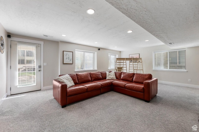 2671 N Garden Dr, Lehi, UT 84043 - living room with a textured ceiling, light colored carpet, baseboards, plenty of natural light, and recessed lighting