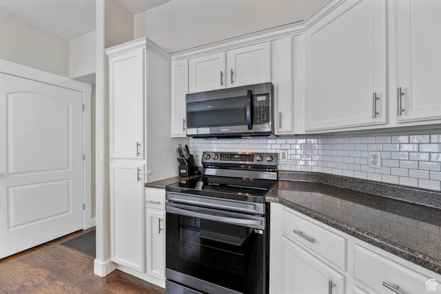 2671 N Garden Dr, Lehi, UT 84043 - kitchen with stainless steel electric stove, black microwave, white cabinets, and backsplash
