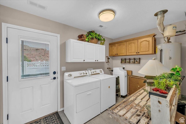 1050 W Red Hills Pkwy Unit 100A, Washington, UT 84780 - washroom featuring washer and dryer, cabinet space, and water heater