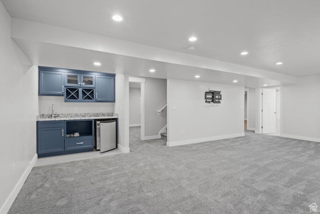 4972 N Sage Park Dr, Eagle Mountain, UT 84005 - indoor bar featuring light carpet, recessed lighting, refrigerator, stairway, and baseboards