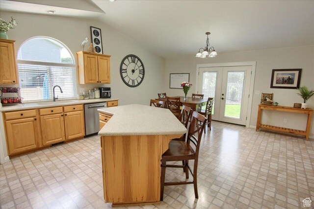 7939 S 2450 E, South Weber, UT 84405 - kitchen featuring stainless steel dishwasher, a sink, light countertops, a kitchen breakfast bar, and a chandelier