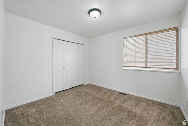 1776 N Belvedere Way W, Layton, UT 84041 - unfurnished bedroom featuring carpet flooring, a closet, and baseboards