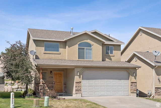 1776 N Belvedere Way W, Layton, UT 84041 - view of front of home featuring stucco siding, stone siding, concrete driveway, an attached garage, and a front yard