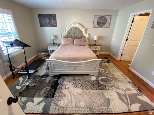 85 River Pointe Dr, Logan, UT 84321 - bedroom featuring wood finished floors and baseboards