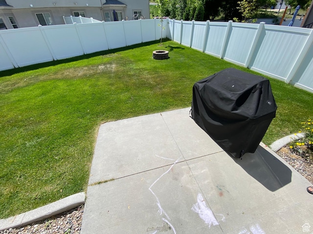 85 River Pointe Dr, Logan, UT 84321 - view of yard with an outdoor fire pit and a patio