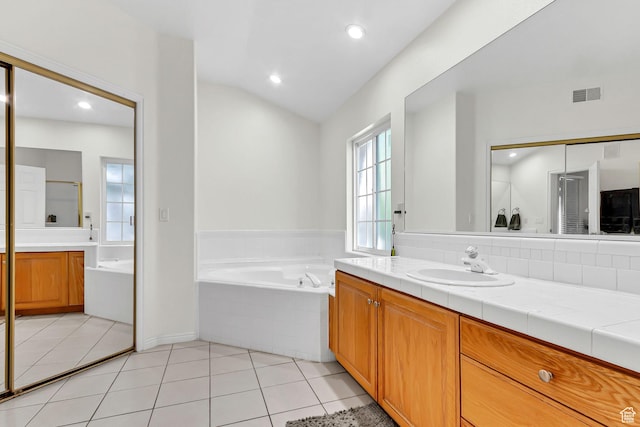 4910 N University Ave Unit 52, Provo, UT 84604 - bathroom featuring vanity, a bath, tile patterned flooring, recessed lighting, and lofted ceiling