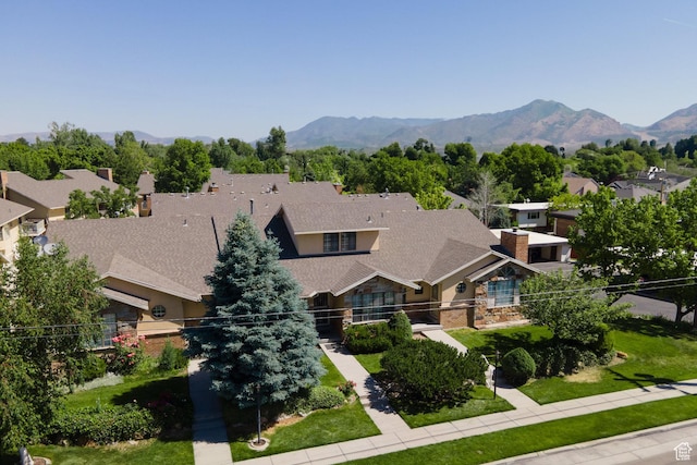 1155 E Murray Holladay Rd, Millcreek, UT 84117 - view of front of home with a residential view and a mountain view