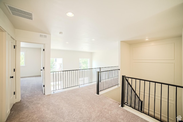 10926 S Little Sahara Dr Unit 1002, South Jordan, UT 84009 - hall with an upstairs landing, carpet floors, plenty of natural light, and recessed lighting