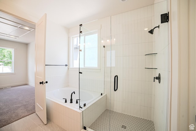10926 S Little Sahara Dr Unit 1002, South Jordan, UT 84009 - bathroom with a garden tub, a stall shower, and tile patterned floors